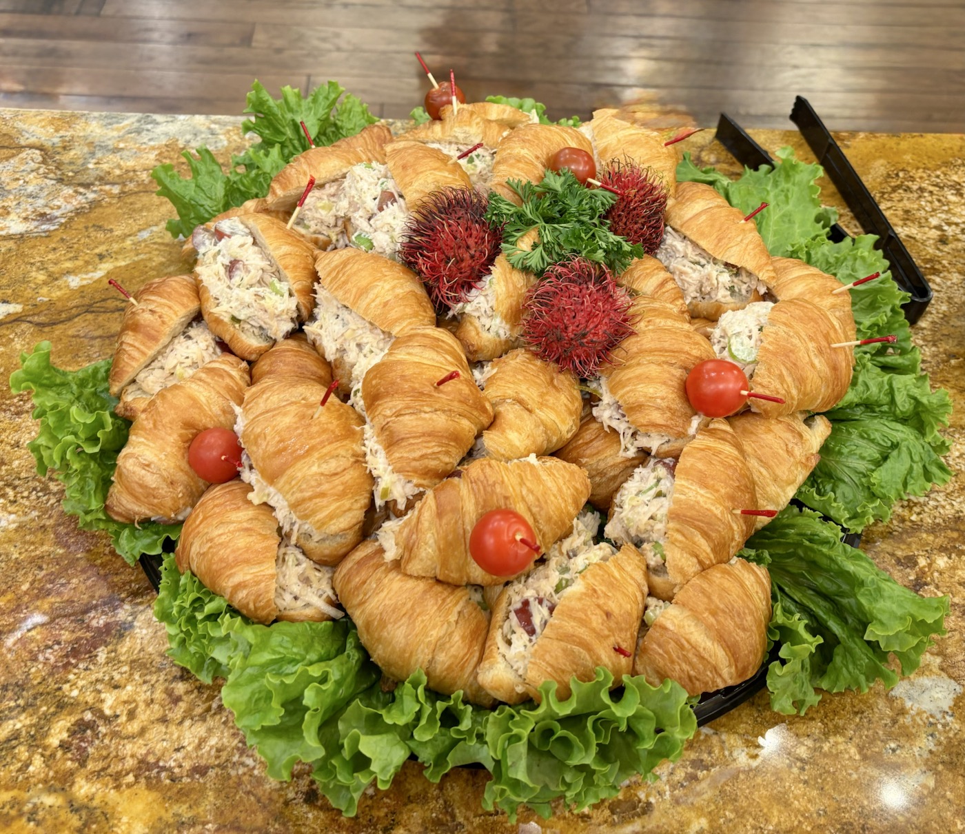 Chicken salad croissant platter prepared for a gathering