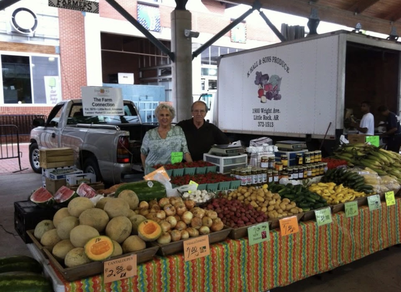 The Farm Connection produce stand with homegrown produce signs